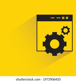 web and gear on yellow background