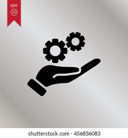 Web icon. Gears (mechanism) in hand