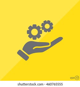 Web icon. Gears (mechanism) in hand