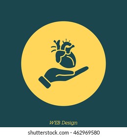 Web icon. Human heart in hand