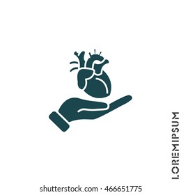 Web icon. Human heart in hand