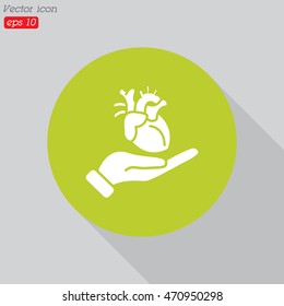Web icon. Human heart in hand