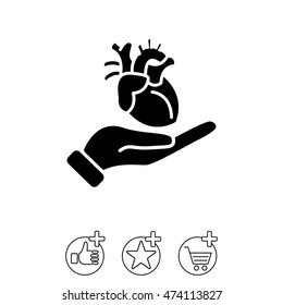 Web icon. Human heart in hand