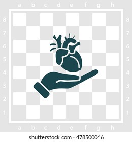 Web icon. Human heart in hand