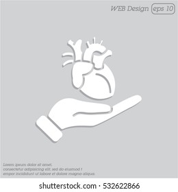 Web icon. Human heart in hand