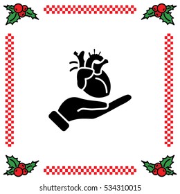 Web icon. Human heart in hand