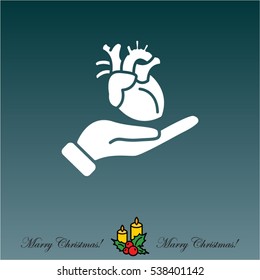 Web icon. Human heart in hand