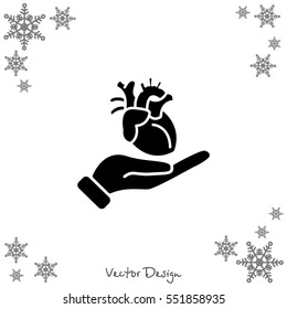 Web icon. Human heart in hand