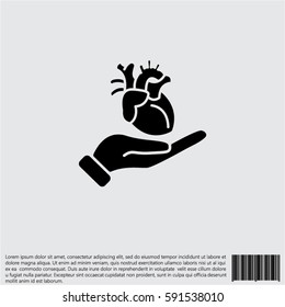 Web icon. Human heart in hand