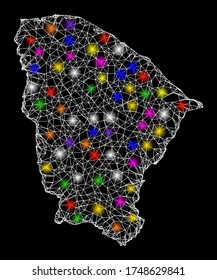 Web mesh vector map of Ceara state with glare effect on a black background. Abstract lines, light spots and dots form map of Ceara state constellation.