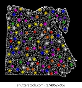 Web mesh vector map of Egypt with glare effect on a black background. Abstract lines, light spots and spheric points form map of Egypt constellation.