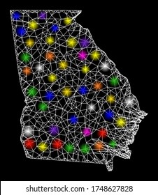 Web mesh vector map of Georgia State with glitter effect on a black background. Abstract lines, light spots and small circles form map of Georgia State constellation.