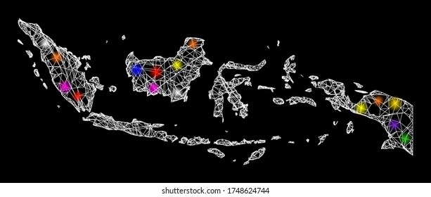 Web mesh vector map of Indonesia with glare effect on a black background. Abstract lines, light spots and small circles form map of Indonesia constellation.