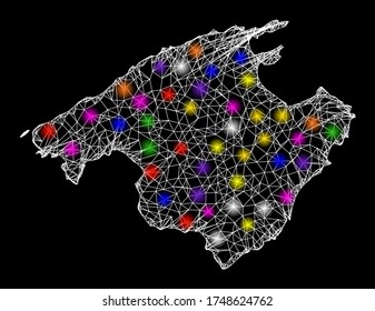 Web mesh vector map of Majorca with glare effect on a black background. Abstract lines, light spots and dots form map of Majorca constellation.