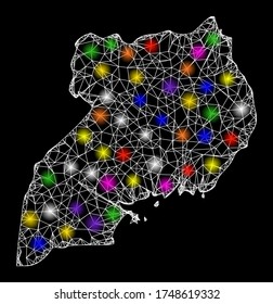 Web mesh vector map of Uganda with glare effect on a black background. Abstract lines, light spots and small circles form map of Uganda constellation.