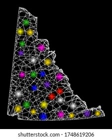 Web mesh vector map of Yukon Province with glare effect on a black background. Abstract lines, light spots and dots form map of Yukon Province constellation.