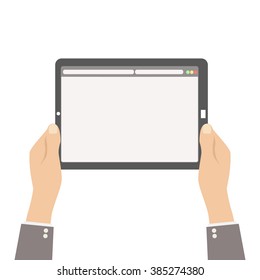 web site on tablet screen in human hands