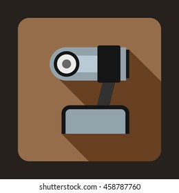 Webcam icon in flat style on a coffee background