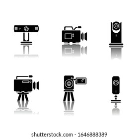 Webcams drop shadow black glyph icons set. Digital video cameras. Online chatting, conference. Surveillance. Portable recording gadgets. Mobile devices. Isolated vector illustrations on white space