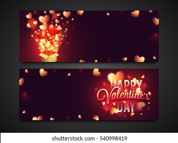 Website header or banner set with glowing hearts decoration for Happy Valentine's Day celebration.