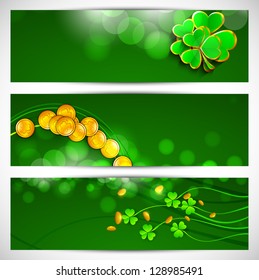 Website header or banner set for St. Patrick's Day celebration with shamrock leaves and gold coins..