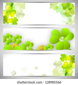 Website header or banner set for St. Patrick's Day celebration with shamrock leaves.