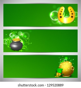 Website header or banner set for St. Patrick's Day celebration with gold coins pot, beer mugs and horseshoe.