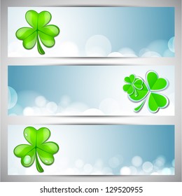 Website header or banner set for St. Patrick's Day celebration with shamrock leaves.