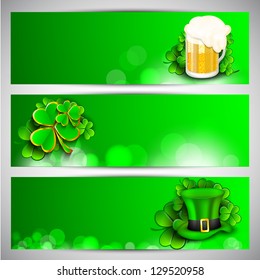 Website header or banner set for St. Patrick's Day celebration with leprechaun hat, beer mug and shamrock leaves.