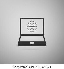 Website on laptop screen icon isolated on grey background. Globe on screen of laptop symbol. World wide web symbol. Internet symbol for your web site design, logo. Flat design. Vector Illustration