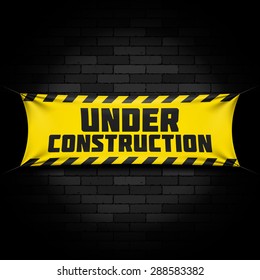 Website under construction banner on black. Vector.