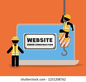website under construction with laptop