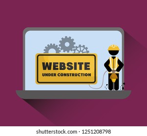 website under construction with laptop