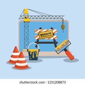 website under construction with laptop