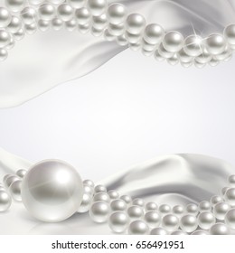 wedding background with pearls and white satin fabric