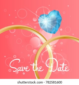 Wedding Background with rings and gemstone, bokeh background. Save the date invitation card