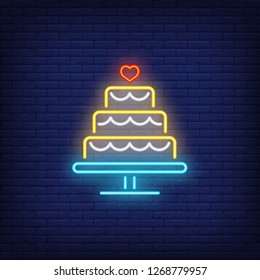 Wedding cake neon sign. Glowing neon big cake on brick wall background. Vector illustration can be used for wedding, marriage, engagement