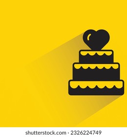 wedding cake with shadow on yellow background
