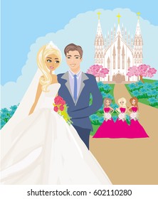 Wedding couple in front of a church