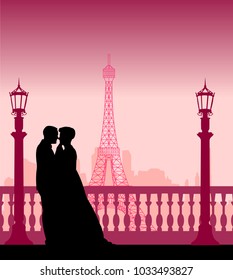 Wedding couple in front of Eiffel tower in Paris silhouette, one in the series of similar images