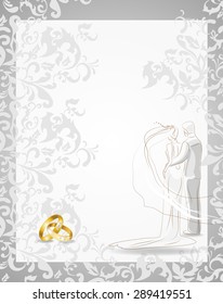 Wedding couple on background with rings