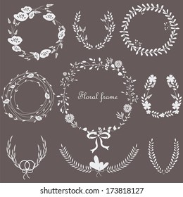 Wedding floral frames with laurels and flowers isolated on black background