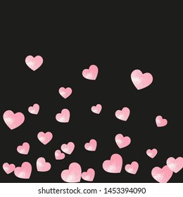 Wedding glitter confetti with hearts on isolated back. Shiny falling sequins with shimmer and sparkles. Design with pink wedding glitter for party invitation, event banner, flyer, birthday card.