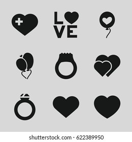 Wedding icons set. set of 9 wedding filled icons such as heart with cross, love word, heart baloons, heart, ring