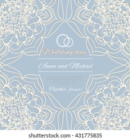 Wedding invitation. Wedding card with abstract ornament on a blue background. Circular carved pattern.
