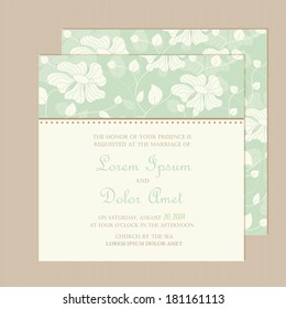 Wedding invitation card or announcement with beautiful floral background.