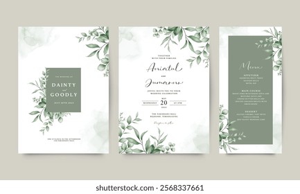 Wedding invitation card arranged with green leaves