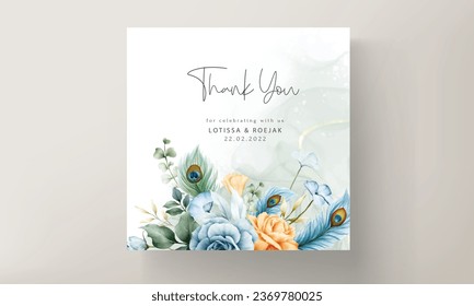 wedding invitation card with beautiful floral and peacock feather