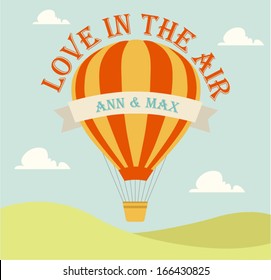 Wedding invitation card with flying hot air balloon in the sky with text