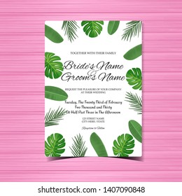wedding invitation card with gorgeous tropical leaves